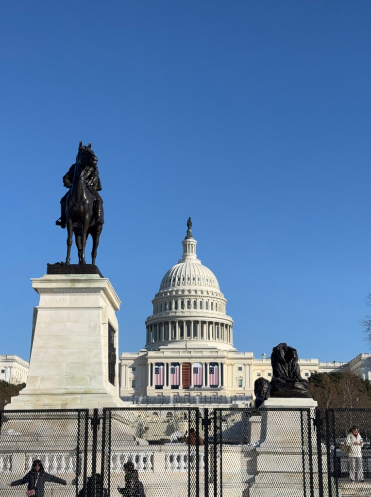The US Capitol Building with flags and grandstands for the Second Inauguration of Donald Trump.